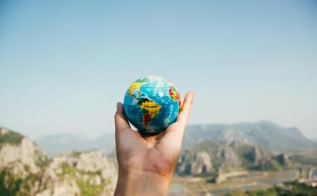 hand holding globe